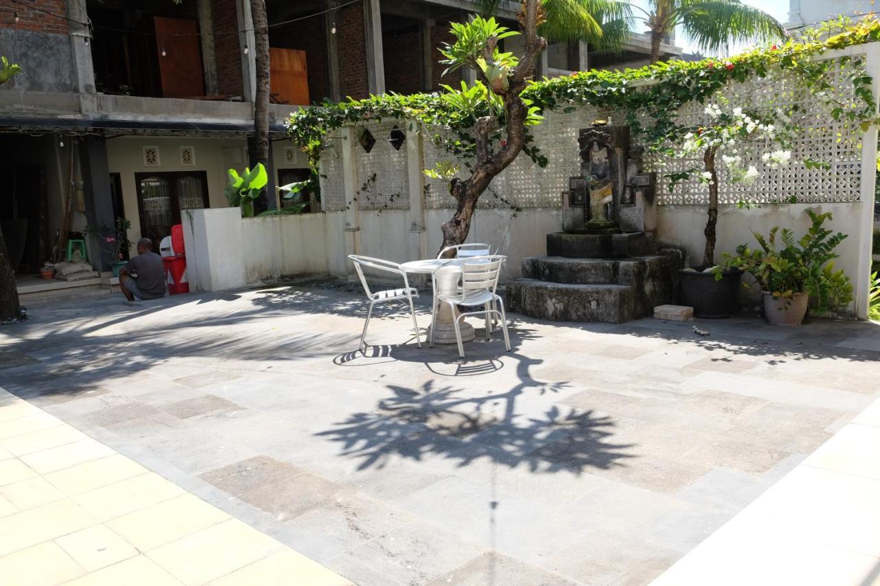 Отель Palm Garden Kuta Кута Экстерьер фото