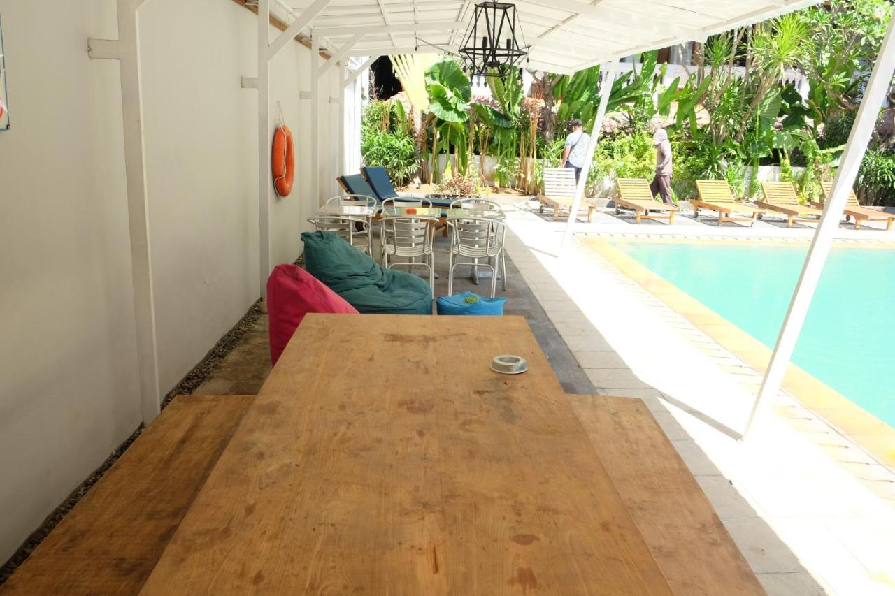 Отель Palm Garden Kuta Кута Экстерьер фото