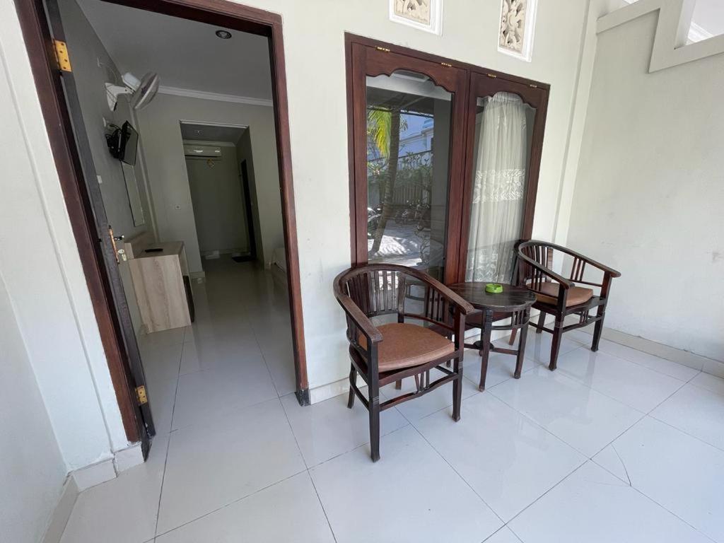 Отель Palm Garden Kuta Кута Экстерьер фото