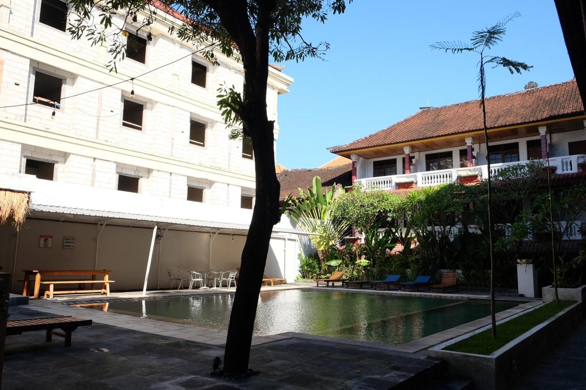 Отель Palm Garden Kuta Кута Экстерьер фото