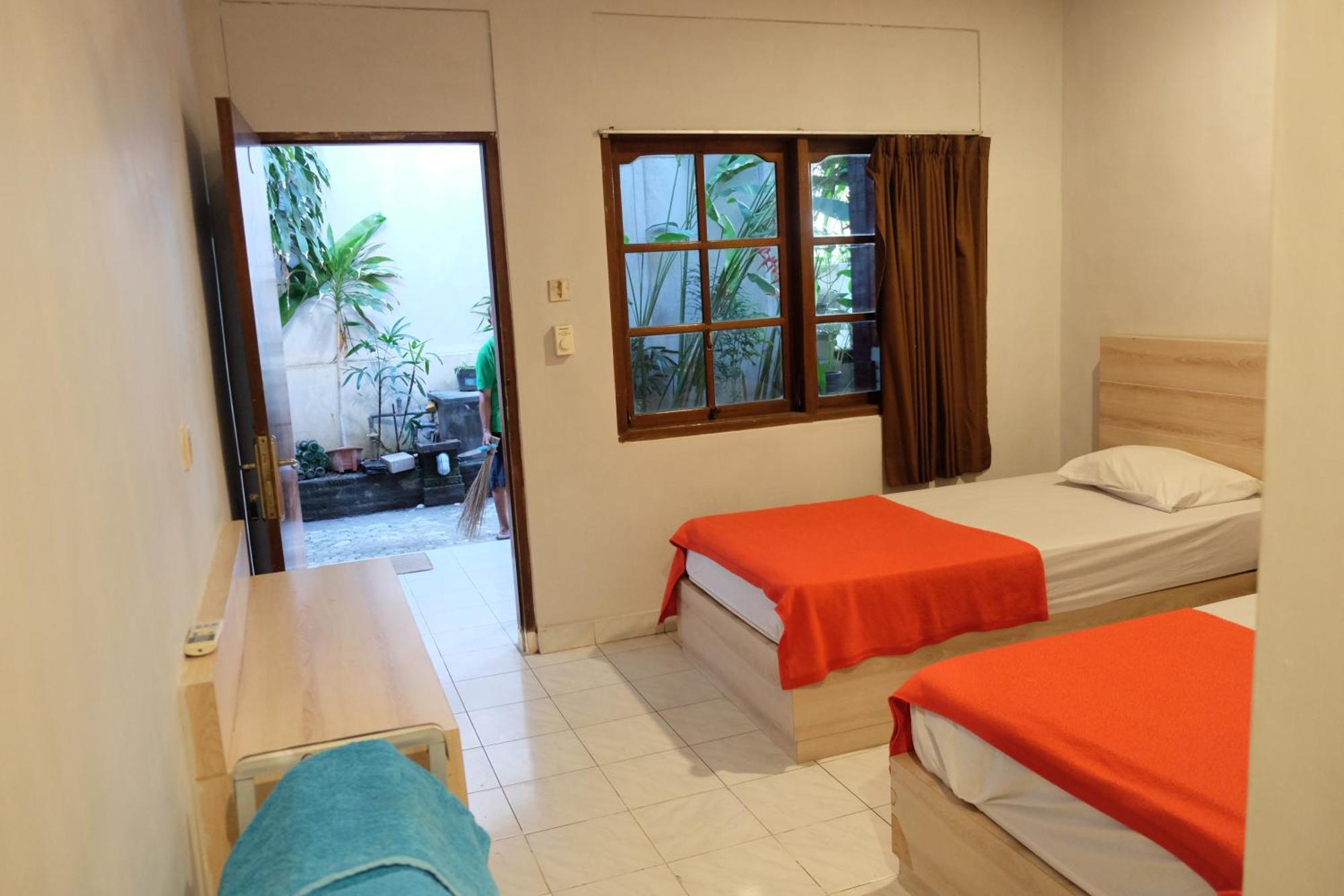 Отель Palm Garden Kuta Кута Экстерьер фото