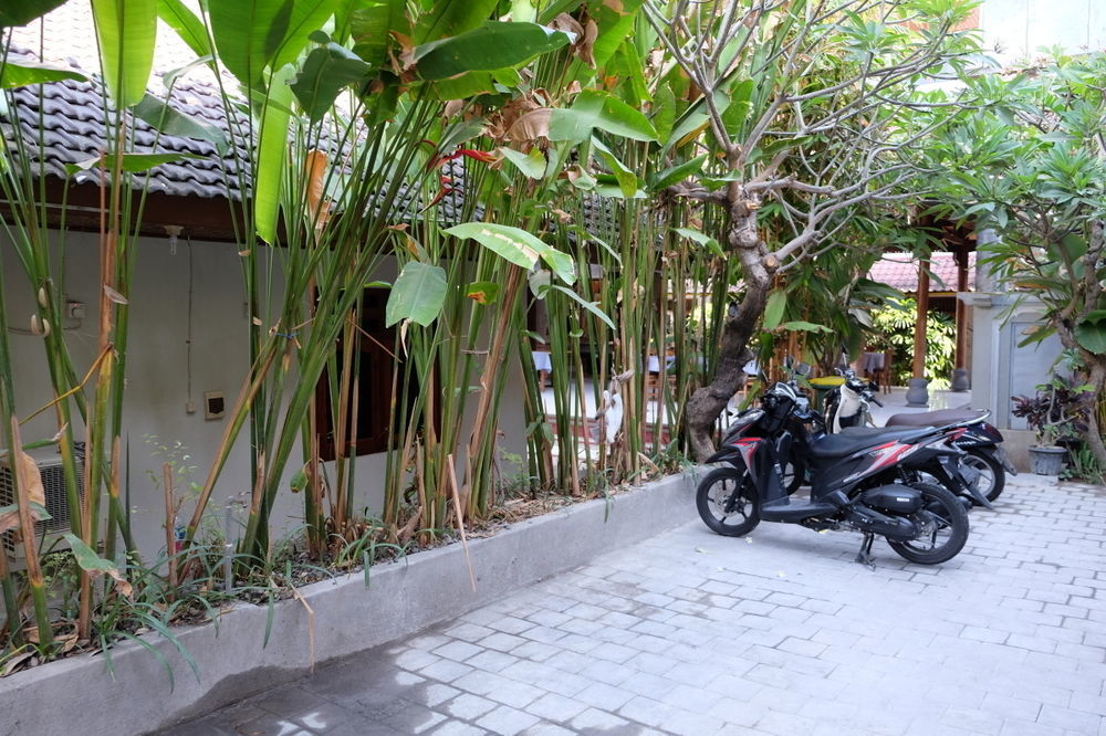 Отель Palm Garden Kuta Кута Экстерьер фото