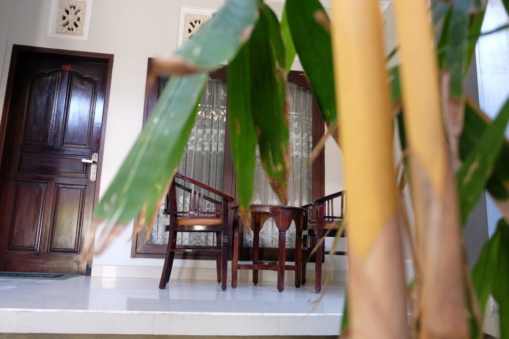 Отель Palm Garden Kuta Кута Экстерьер фото