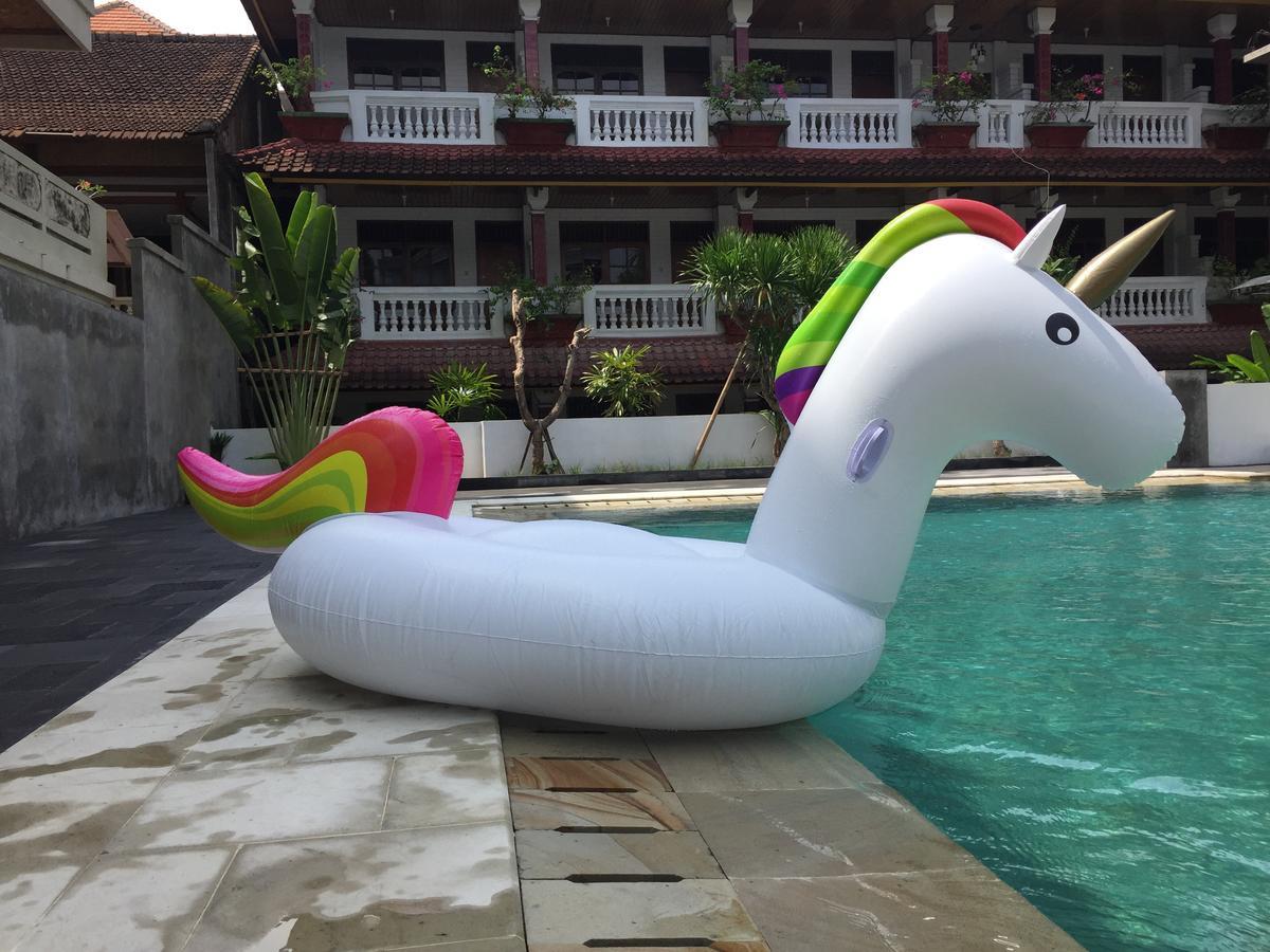 Отель Palm Garden Kuta Кута Экстерьер фото