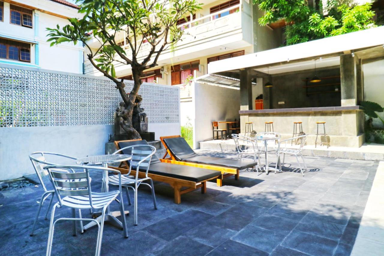 Отель Palm Garden Kuta Кута Экстерьер фото