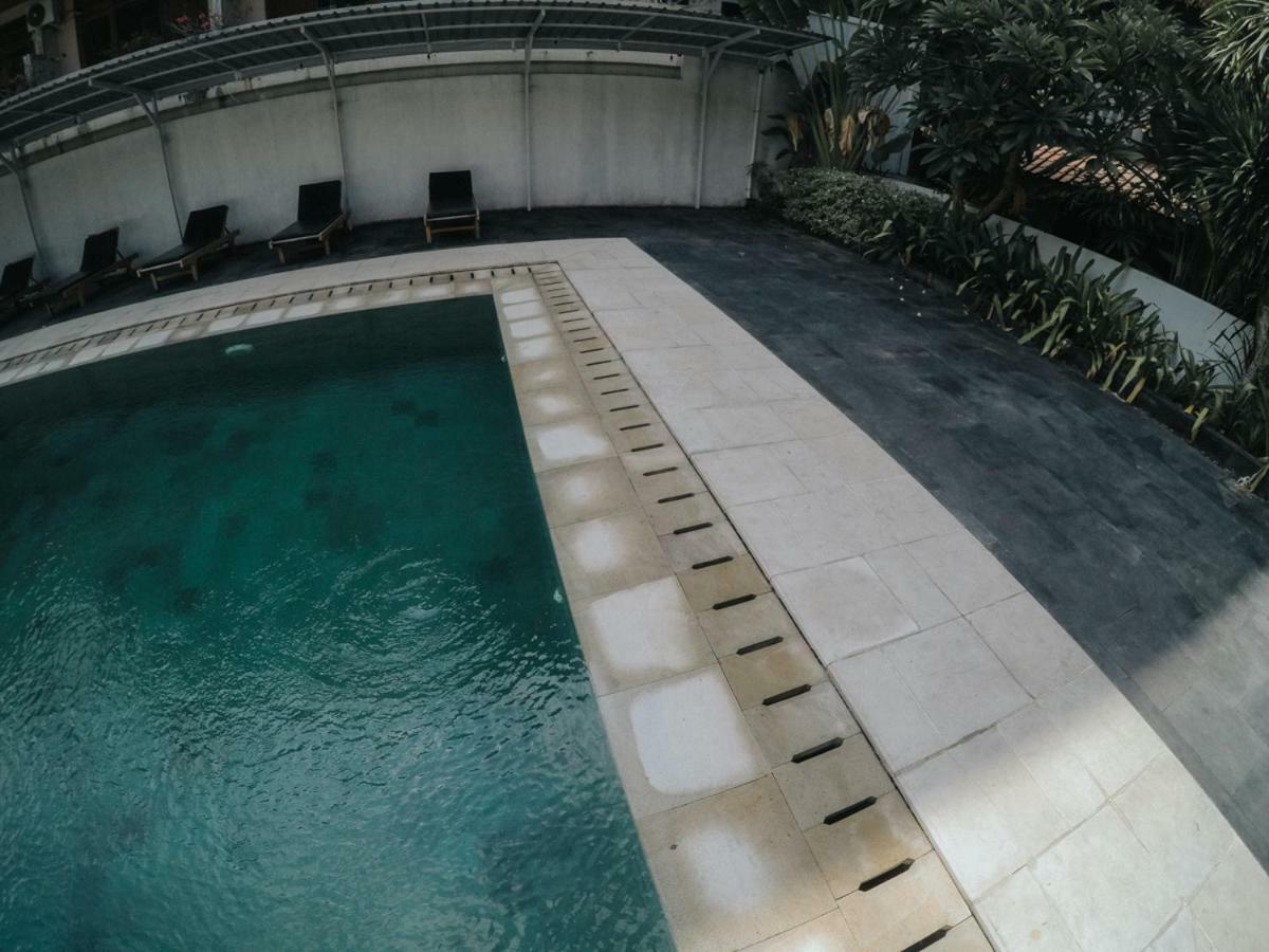 Отель Palm Garden Kuta Кута Экстерьер фото